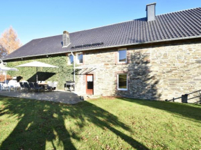 Гостиница Quaint Cottage in Kuchelscheid with Terrace  Бютгенбах